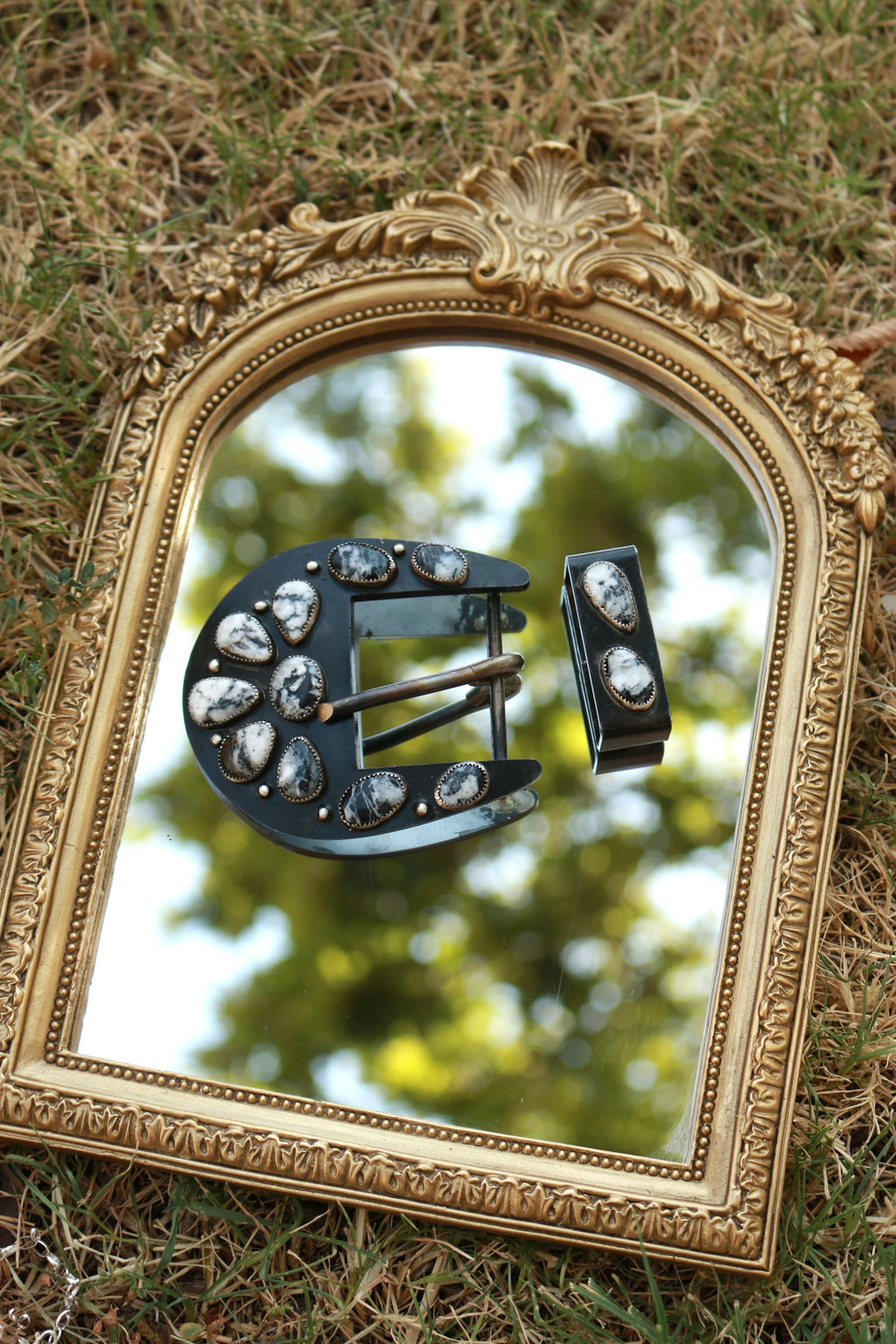White Buffalo belt buckle